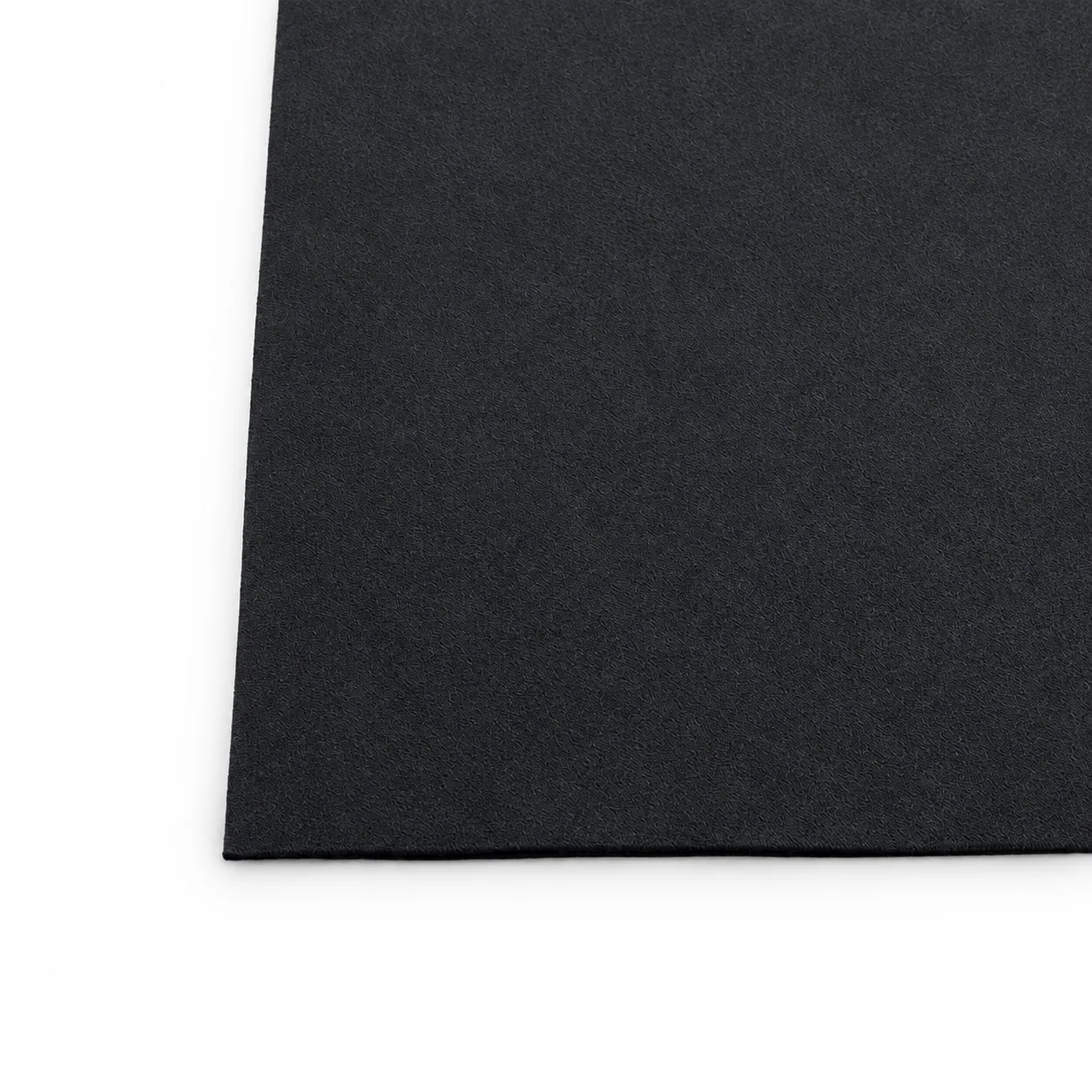 Macro close-up of the edge and corner of the Tactilus sensor mat fabric